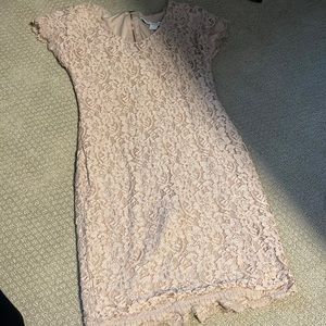 Diane Von Furstenberg Body hugging dress; looks even better on!!